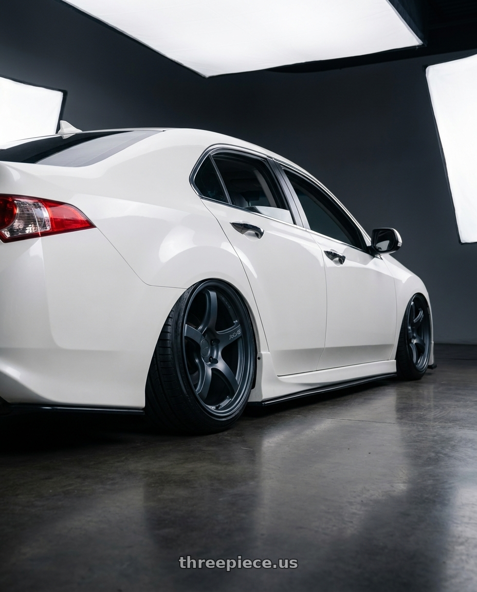 2013 Acura TSX with Gram Lights 57CR 5x114.3 19x9.5+25 Gunblue II wheels rear three quarter view slight stretch tires