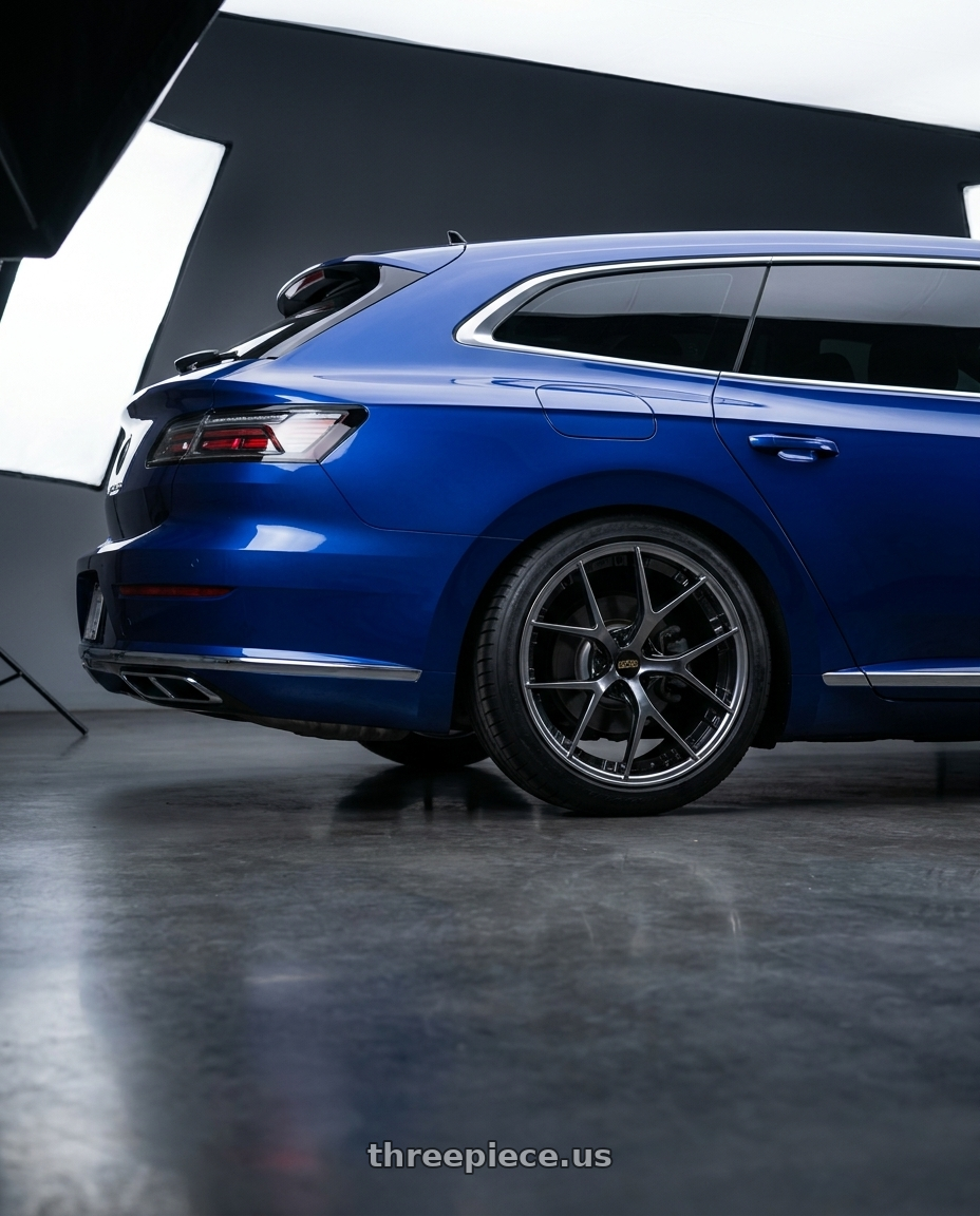 2022 vw Arteon shooting brake Lapiz Blue with BBS RI-S 5x112 20x9.0+34 Diamond Black wheels rear three quarter view meaty tires