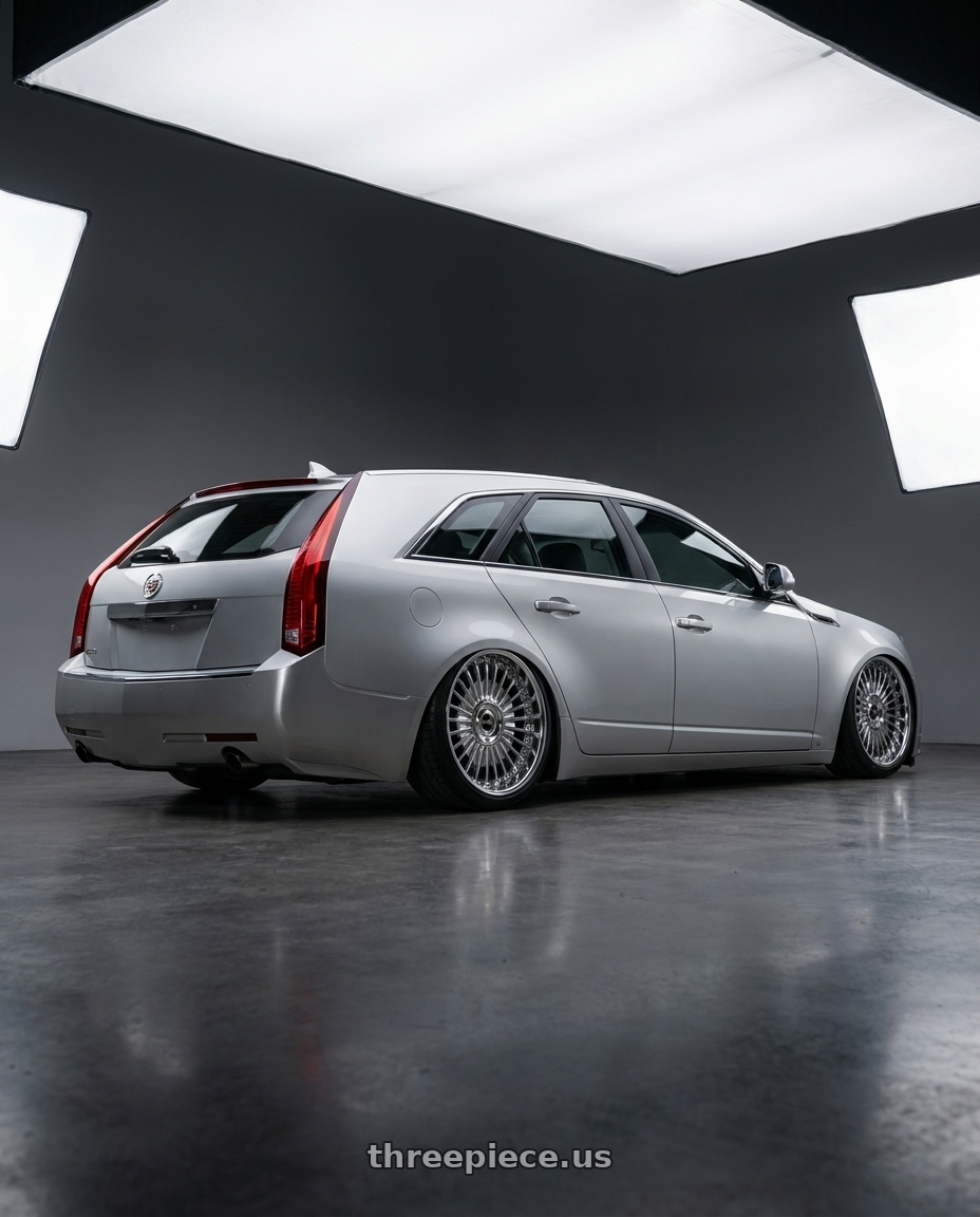 2010 Cadillac cts wagon with Work Emitz Black Polish 5x100 19x10.0 +38 wheels rear three quarter view slight stretch tires