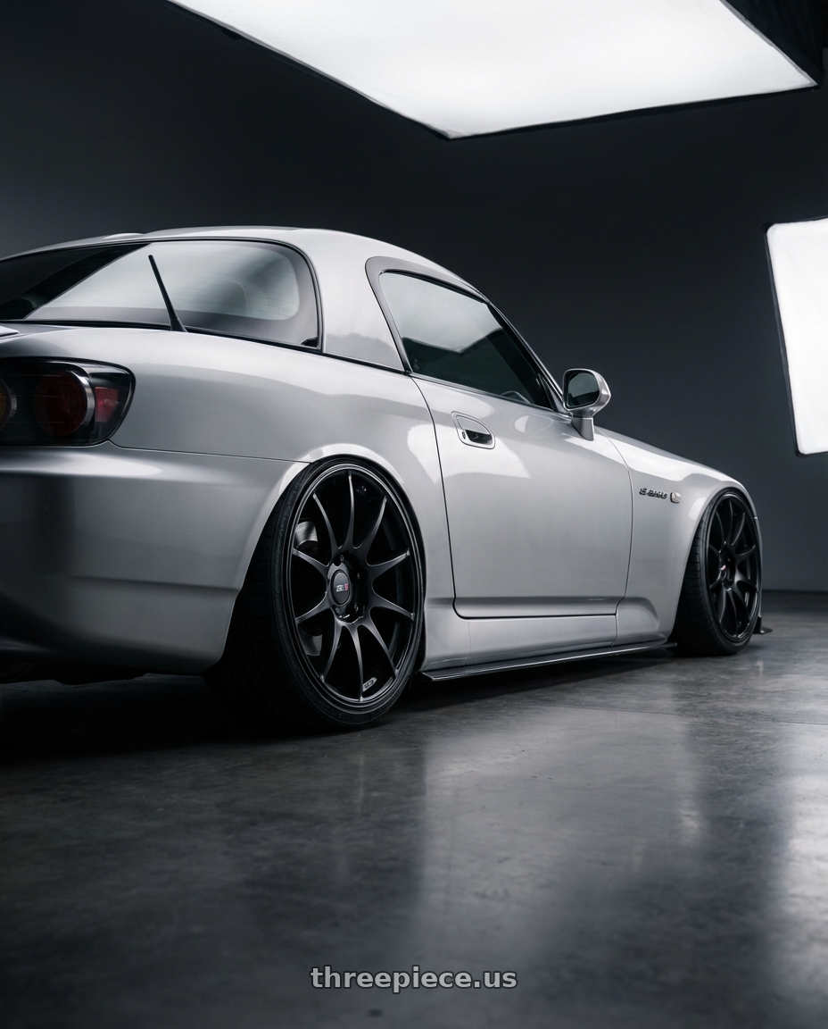 2009 Honda S2000 with Ssr Gtv01 5x114.3 18x8.5+40  FLAT BLACK wheels rear three quarter view slight stretch tires