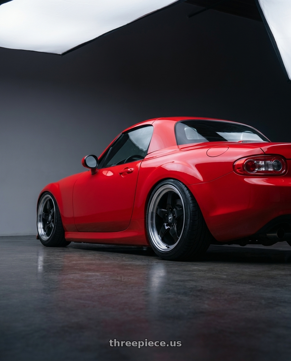 2012 Mazda MX-5 Miata NC with Forgestar D5 Drag 5x114.3 17x7 +6 Gloss Black Machined wheels rear three quarter view slight stretch tires