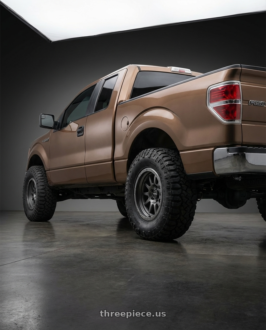 2013 Ford F-150 with Vision Off-Road 111 Nemesis 6x135 20x9+0 Gunmetal wheels rear three quarter view meaty tires