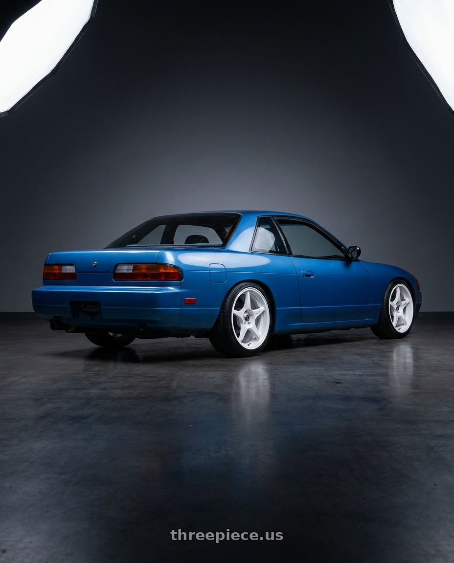 1993 nissan 240sx coupe base jet stream blue with Stage Wheels Knight 5x120 17x9 +10 White wheels rear three quarter view square tires