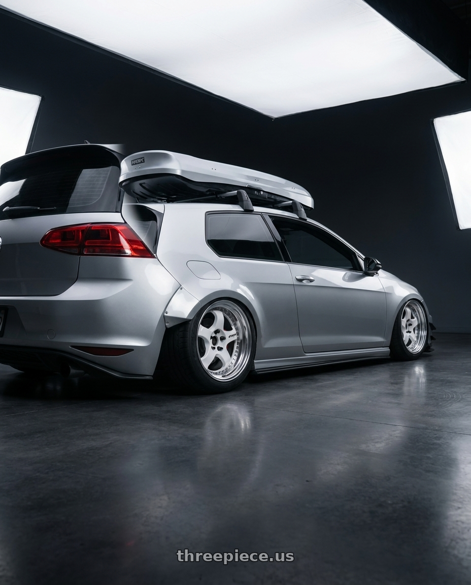 2015 vw gti with Work Meister S1 3P 5x112 17x9+36 W Disk White wheels rear three quarter view meaty tires