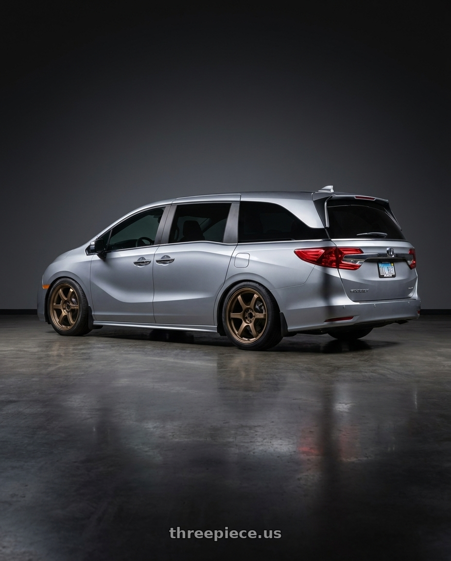 2024 Honda Odyssey with Gram Lights 57DR 5x120 19x8.5 +45 BRONZE 2 wheels rear three quarter view square tires