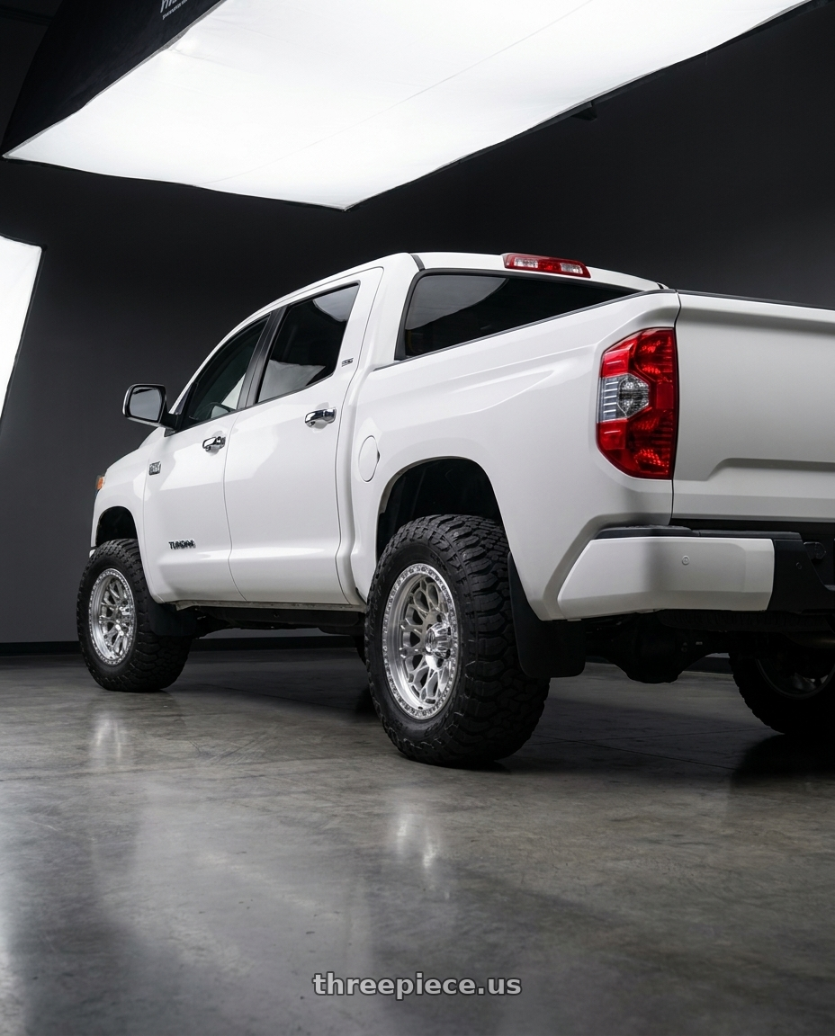 2016 toyota tundra platinum with Fittipaldi Offroad FT101MS 5X150 17x9 -12 Machined Silver wheels rear three quarter view meaty tires