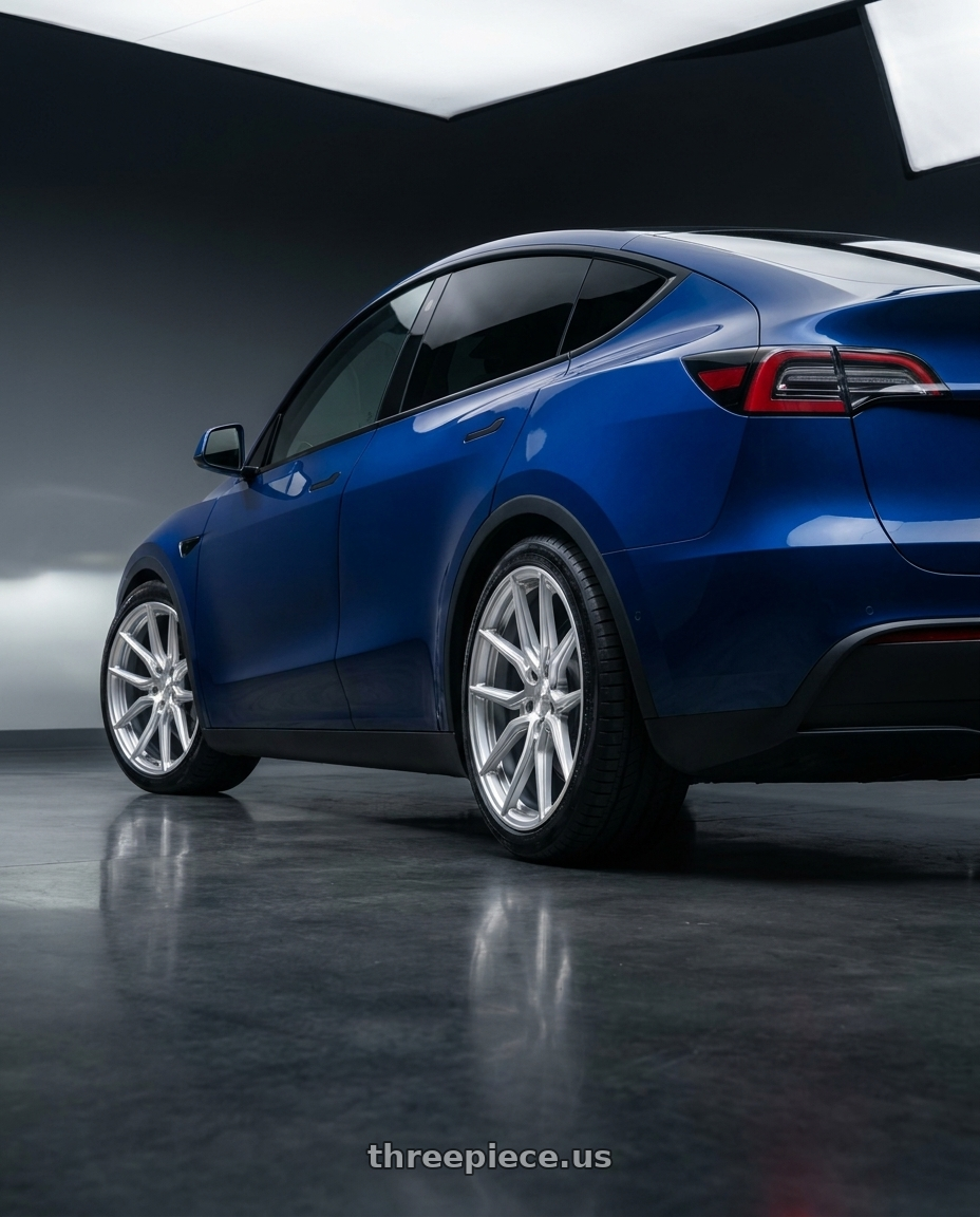2022 Tesla Model Y with VOSSEN HFX-5 6X135 22x9.5 +20 SILVER POLISHED wheels rear three quarter view square tires