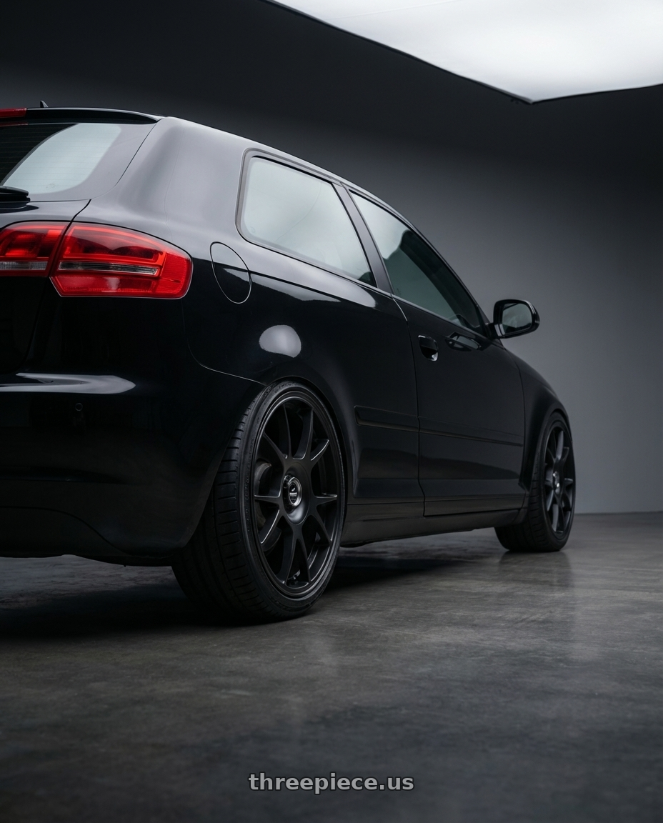 2012 Audi A3 8P with fifteen52 COMP 5x112 / 5x120 18x8.5 +35 ASPHALT BLACK (SATIN BLACK) wheels rear three quarter view square tires