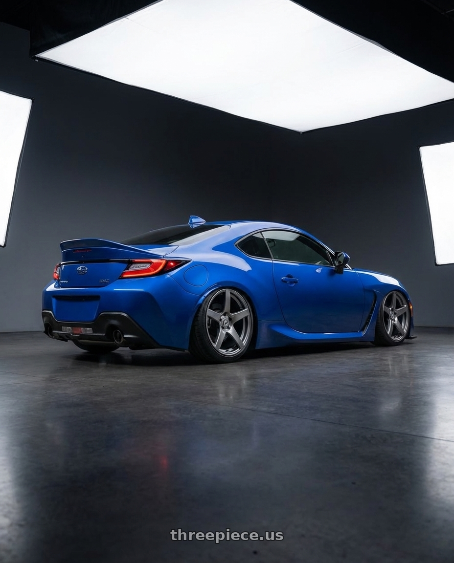 2024 Subaru BRZ with Forgestar CF5 5x114.3 18x9 +35 Gloss Anthracite wheels rear three quarter view slight stretch tires