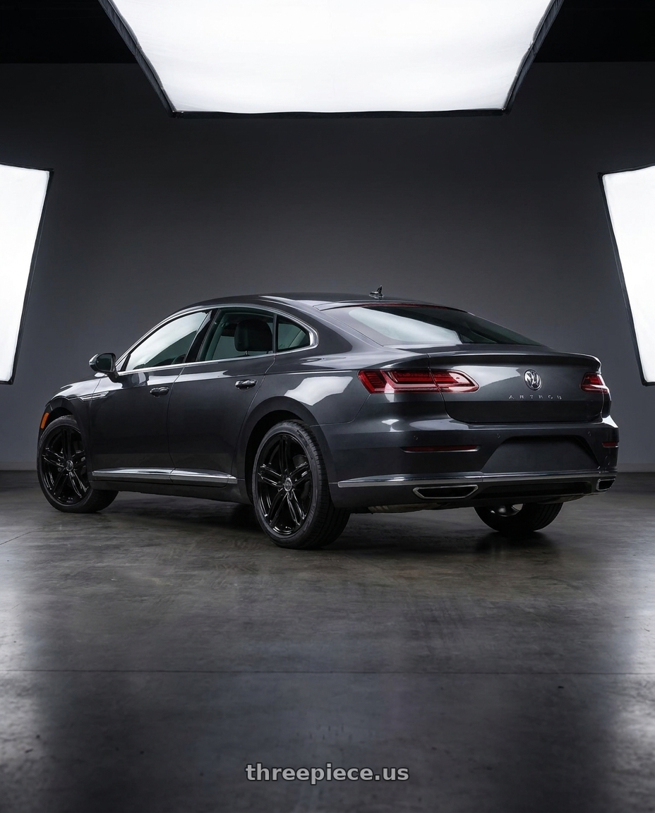 2019 Volkswagen Arteon with OE Wheels AU12 5x112 18x8+45 Gloss Black wheels rear three quarter view square tires