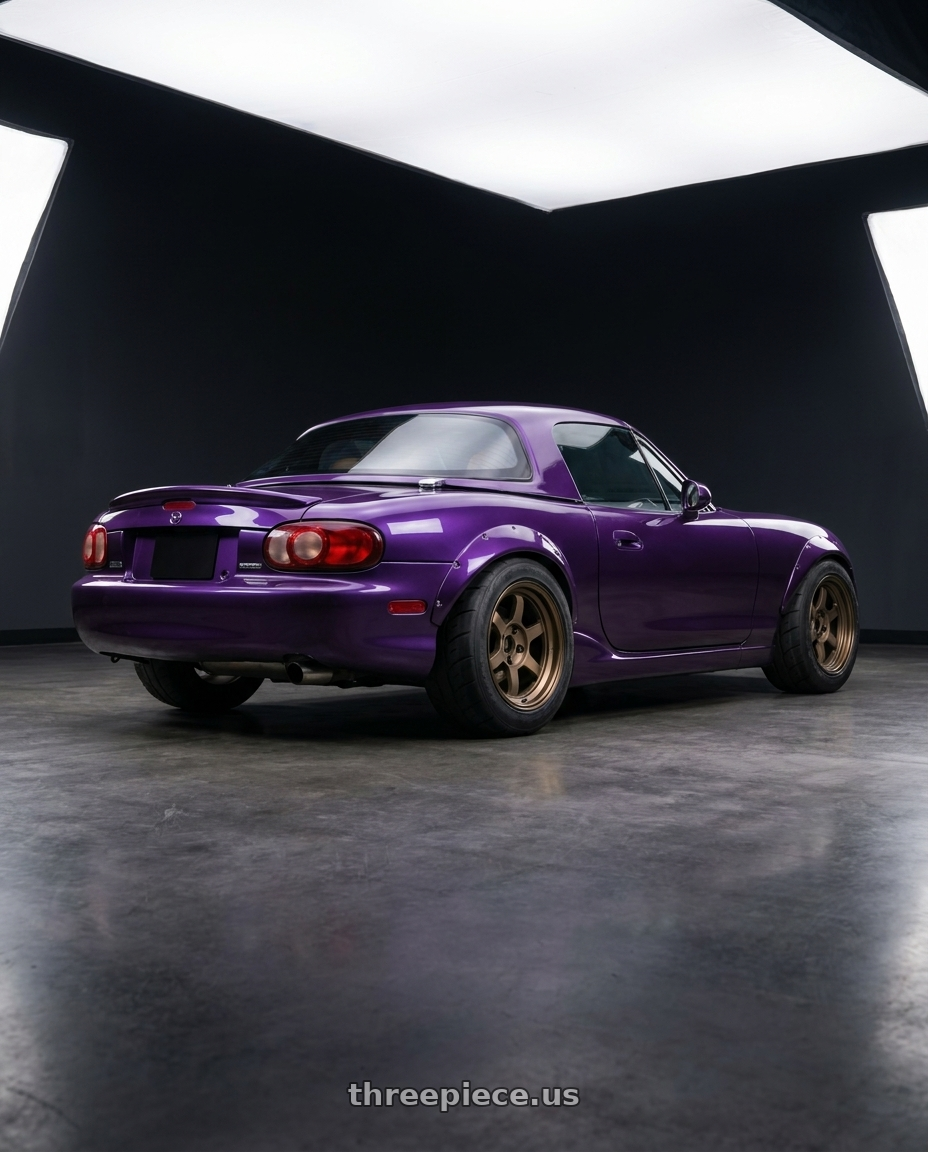 2000 Mazda miata with Volk Racing TE37V 4x100 15x8+0 Bronze wheels rear three quarter view meaty tires