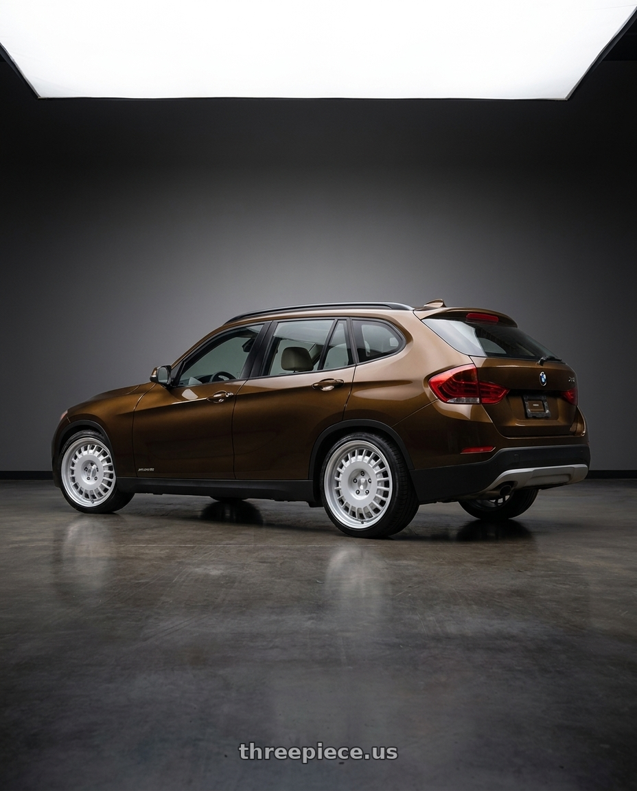 2013 bmw x1 28xi with Rotiform RC205 PMF 5X120 20x8.5 +35 GLOSS SILVER wheels rear three quarter view slight stretch tires