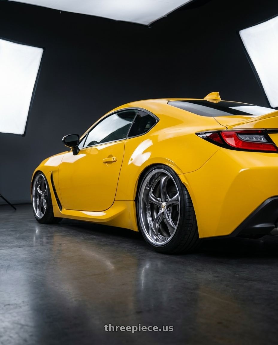 2026 Subaru BRZ STI Sport Yellow Edition with Work Wheels VS-KF 5X114.3 19x8.5+34 Brilliant Silver Black A Disk FULL REVERSE wheels rear three quarter view square tires