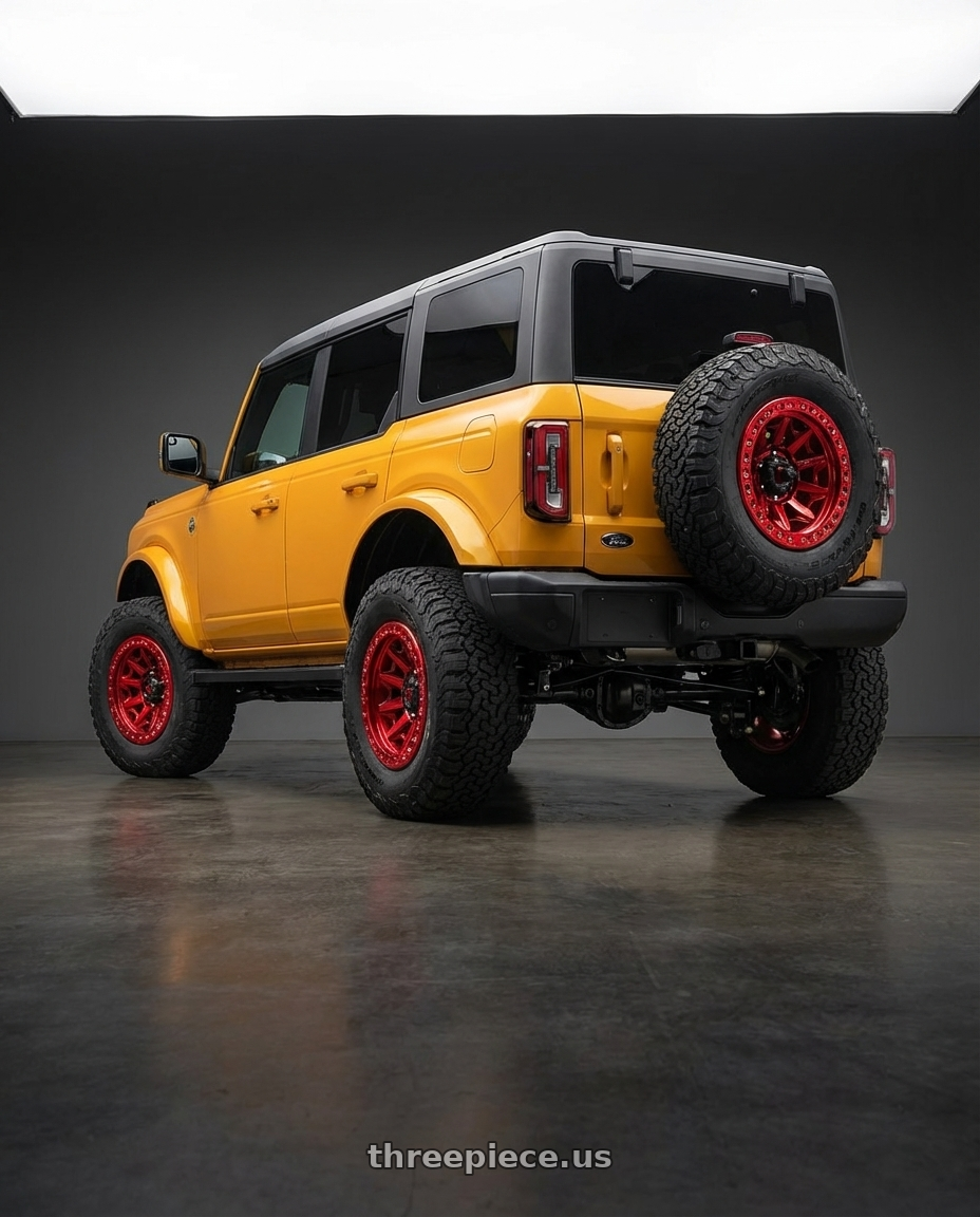 2024 Ford Bronco with Fuel 1PC D113 COVERT BEADLOCK 6X139.7 17X9 -15 CANDY RED wheels rear three quarter view meaty tires