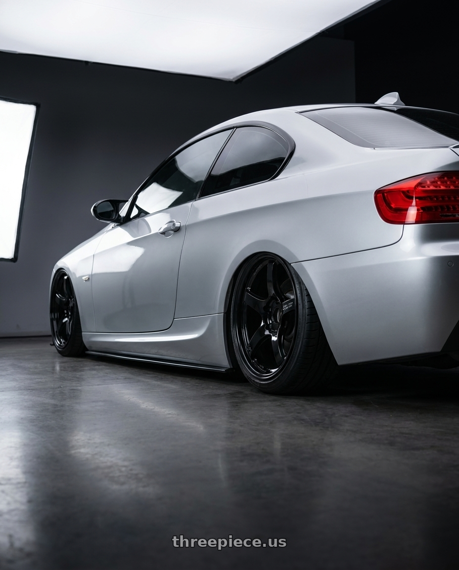 2012 BMW 3 Series E92 with Gram Lights 57CR 5x120 19x10.5+22 Glossy Black wheels rear three quarter view slight stretch tires