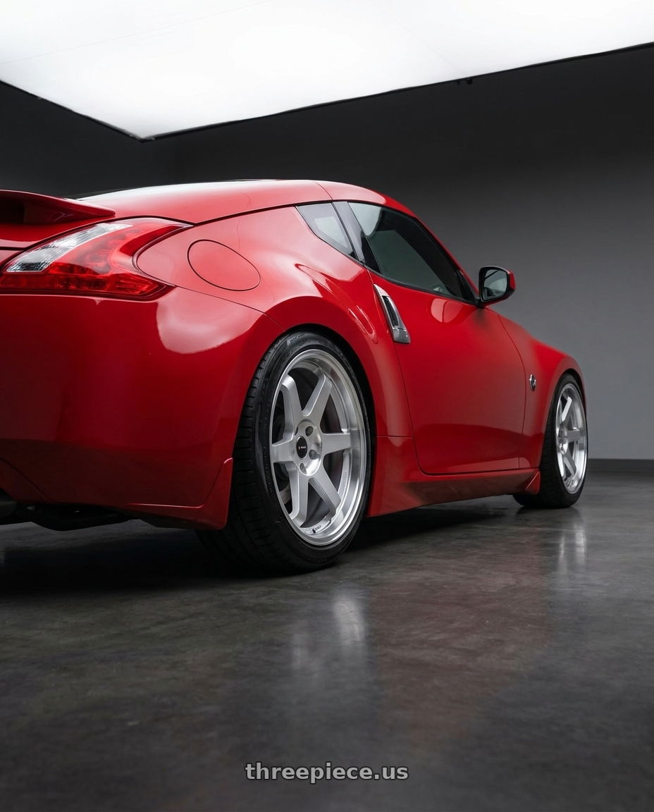 2018 Nissan 370z base with Vors TR37 5x114.3 18x8.5  +35 Silver Machine Face Lip wheels rear three quarter view slight stretch tires
