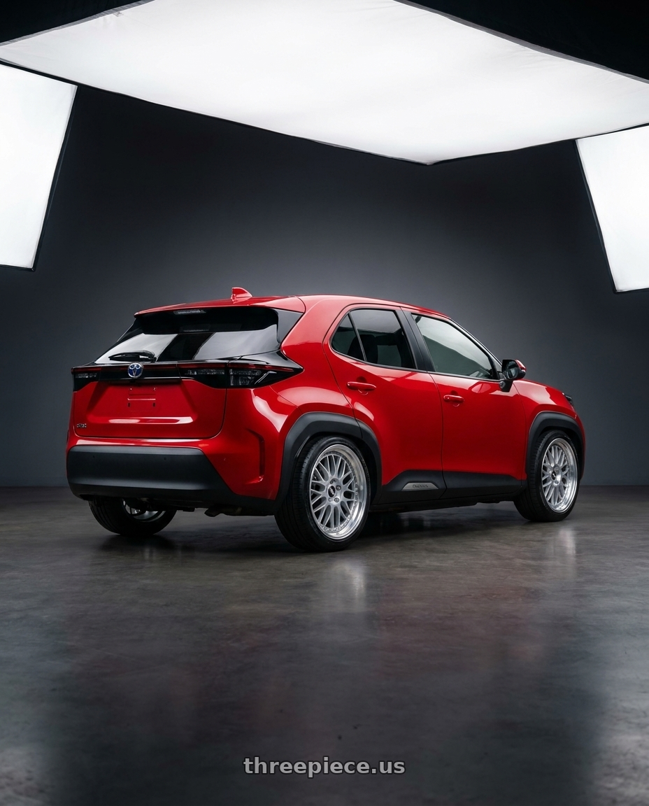 2022 Toyota Yaris Cross with Work Vs-Xx 5x100 18x8.5+45 A Disk Light Grey Silver wheels rear three quarter view square tires