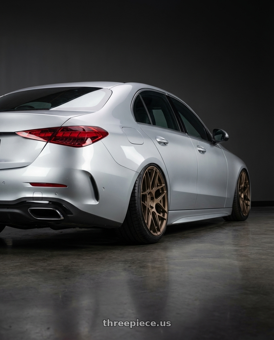 2022 Mercedes-Benz C-Class W206 with Aodhan AFF2 5x112 19x9.5+35 Matte Bronze wheels rear three quarter view slight stretch tires