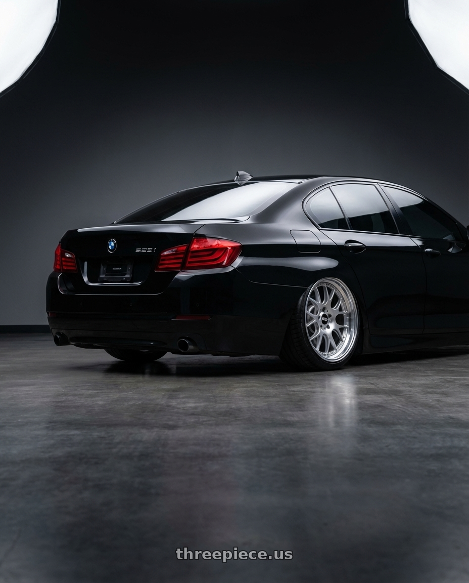 2009 528i bmw with BBS CH-R 5x112 19x8.5 +32 Brilliant Silver Polished Rim Protector wheels rear three quarter view slight stretch tires