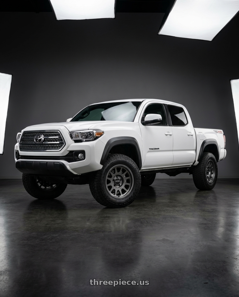 2018 Toyota tacoma with Method MR703 Bead Grip 17x8.5 / 6x5.5 / +35mm Offset / 106.25mm Centerbore - Gloss Titanium Wheel - MR70378560835 wheels