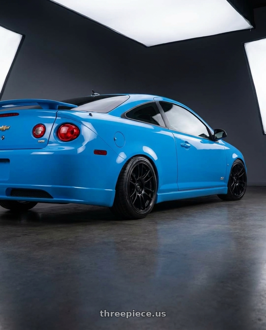 2008 chevy cobalt ss with Enkei GTC02 5x114.3 18x8+45 Matte Black wheels rear three quarter view slight stretch tires