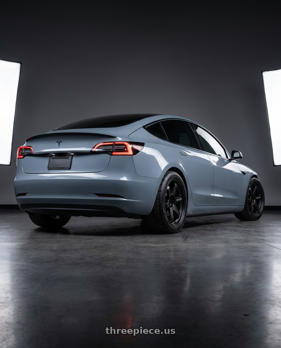 2026 Tesla Model 3 Performance with Volk Racing TE37 ULTRA M-SPEC 5x114.3 19x9.5+28 Matte Black wheels rear three quarter view meaty tires