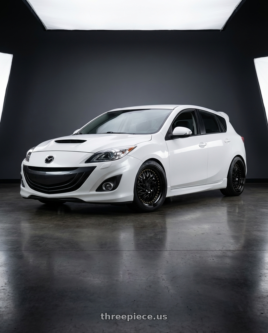 2012 Mazda Mazdaspeed3 with Aodhan DS03 5x114.3 18x9.5 +30 Black Vacuum w/ Gold Rivets wheels