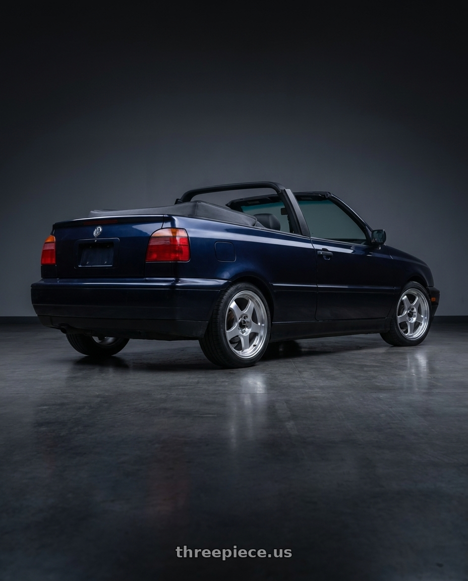 1998 vw cabrio with Vors SP1 4x100/4x114.3 16x7  +38 Silver Machine Face Lip wheels rear three quarter view square tires