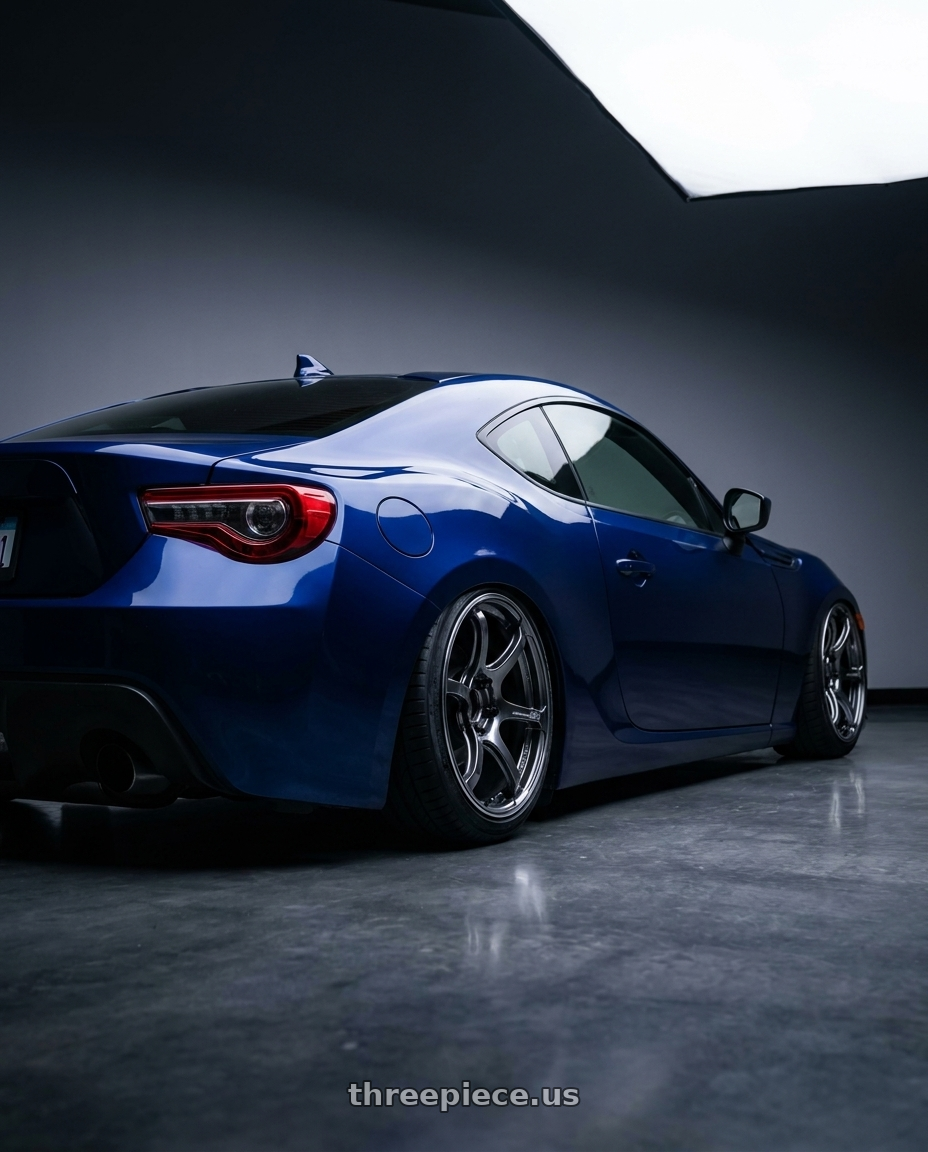 2017 Toyota 86 with Advan Racing RG-4 5x100 18x8.0 +47 RACING HYPER BLACK & RING wheels rear three quarter view square tires