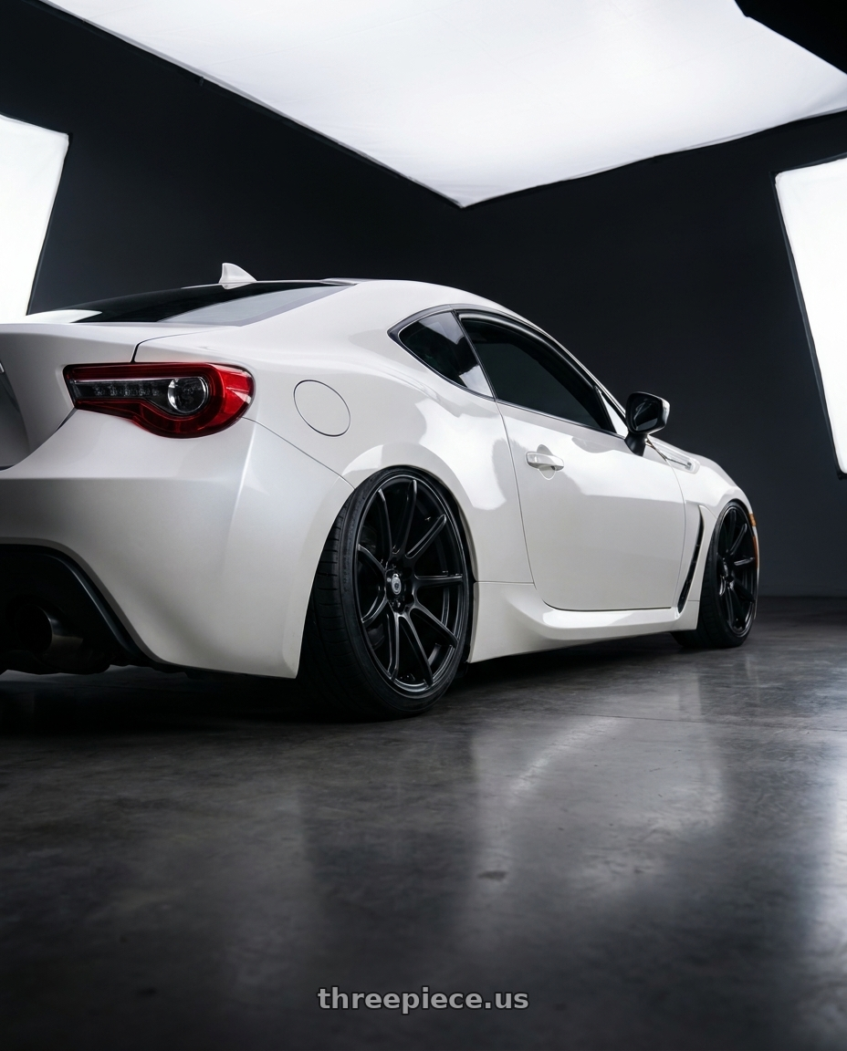 2016 Scion FR-S with Konig Control 5x100/5x114.3 18x8+45 Matte Black wheels rear three quarter view slight stretch tires