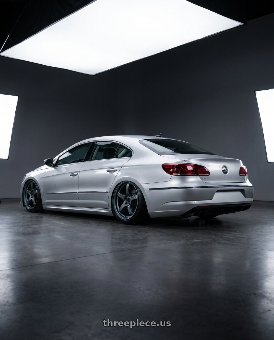 2015 Volkswagen CC with Gram Lights 57CR 5x112 19x8.5+45 Gunblue II wheels rear three quarter view slight stretch tires