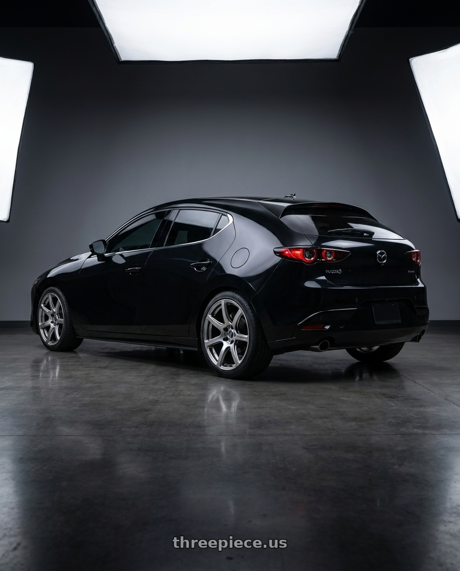 2024 Mazda Mazda3 with Work Emotion T7r 5x114.3 18x8.5 +38 Gt Silver wheels rear three quarter view square tires