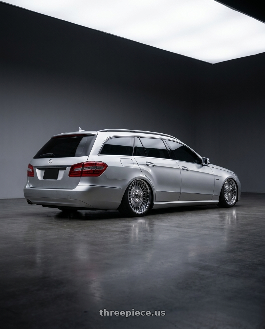 2010 Benz s212 with Work Emitz Chrome 5x114.3 19x9.0 +38 wheels rear three quarter view square tires