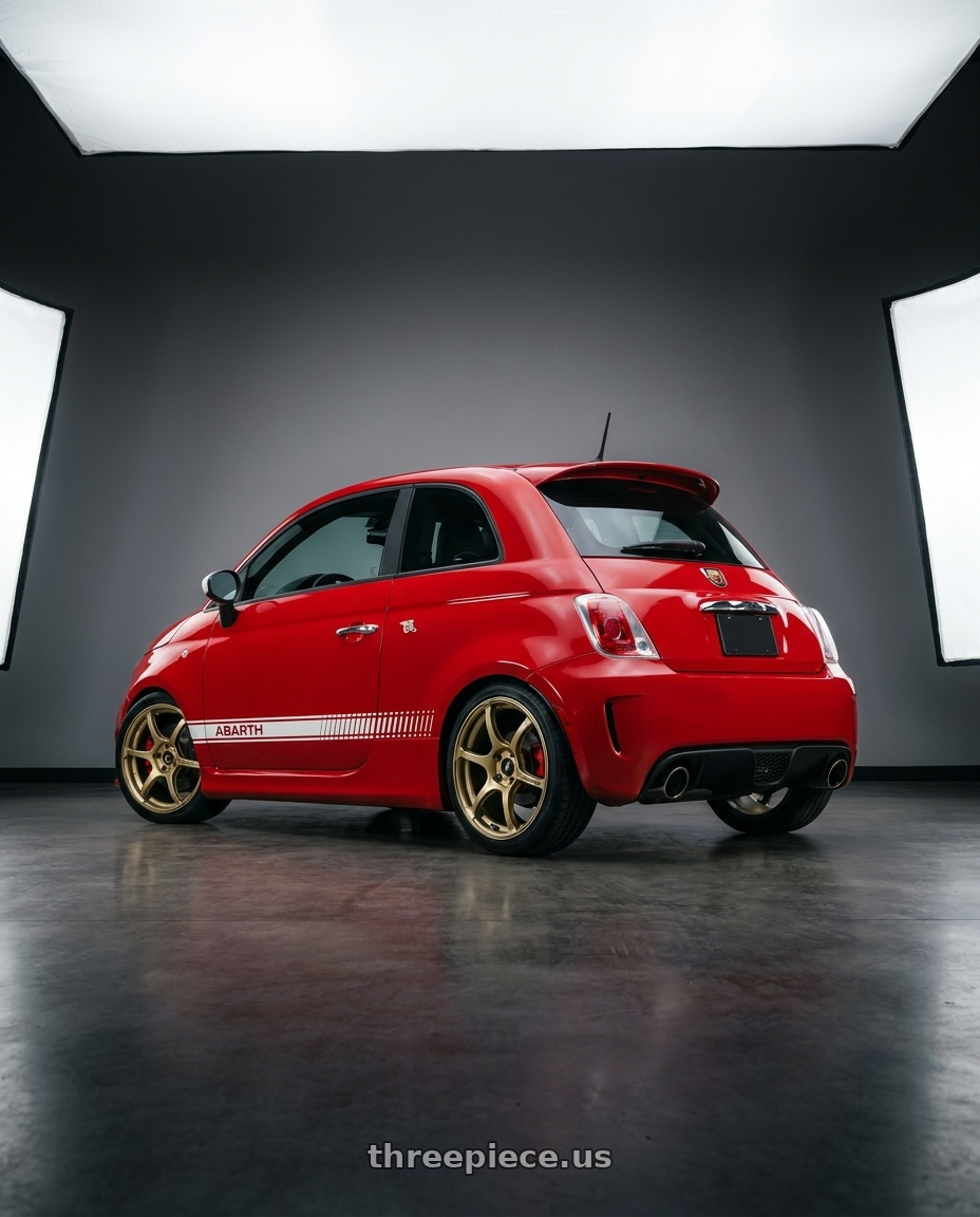 2015 Abarth 595 Compitiozone with Advan RGIII 4x100 18x7.0+42 Gold wheels rear three quarter view square tires