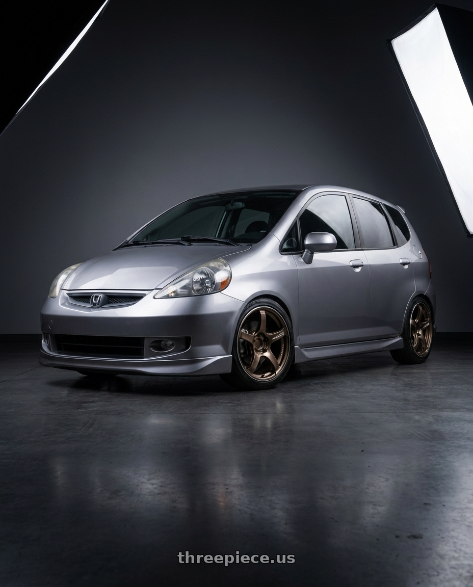 2007 Honda fit sport with Advan Racing TC4 4x100 16x7.0 +42 UMBER BRONZE METALLIC & RING wheels