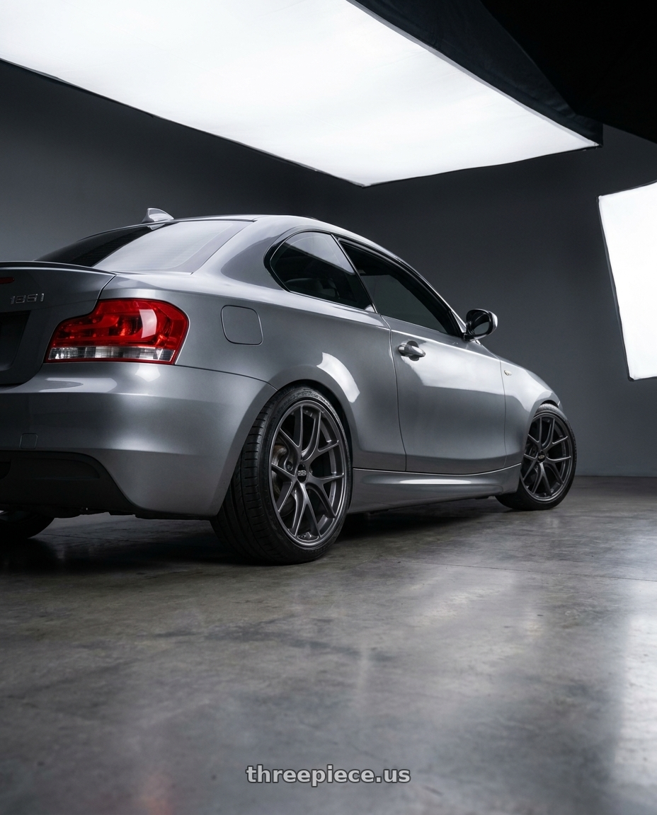 2011 BMW 135I with BBS FI 5x114.3 20x8.75 +44 Titanium wheels rear three quarter view slight stretch tires
