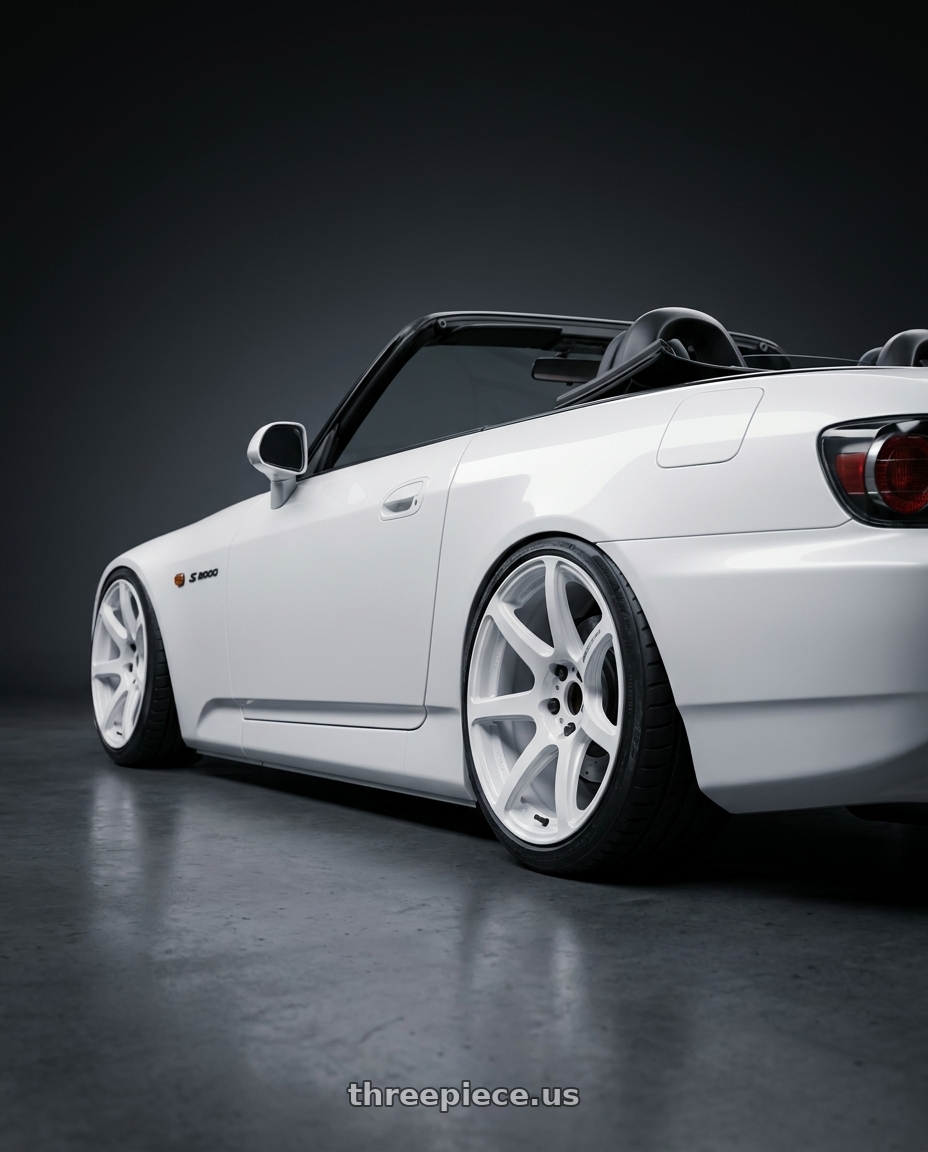 2000 Honda S2000 with Work Emotion T7R wheels rear three quarter view slight stretch tires