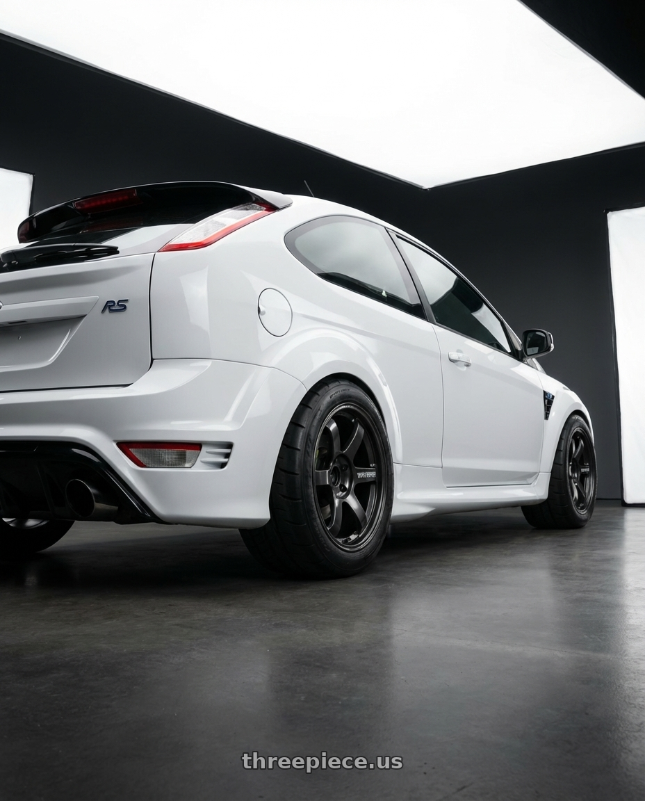 Ford focus Rs 2009 with Volk Racing TE37 SAGA 5x112 17x9 +45 DIAMOND DARK GUNMETAL wheels rear three quarter view meaty tires