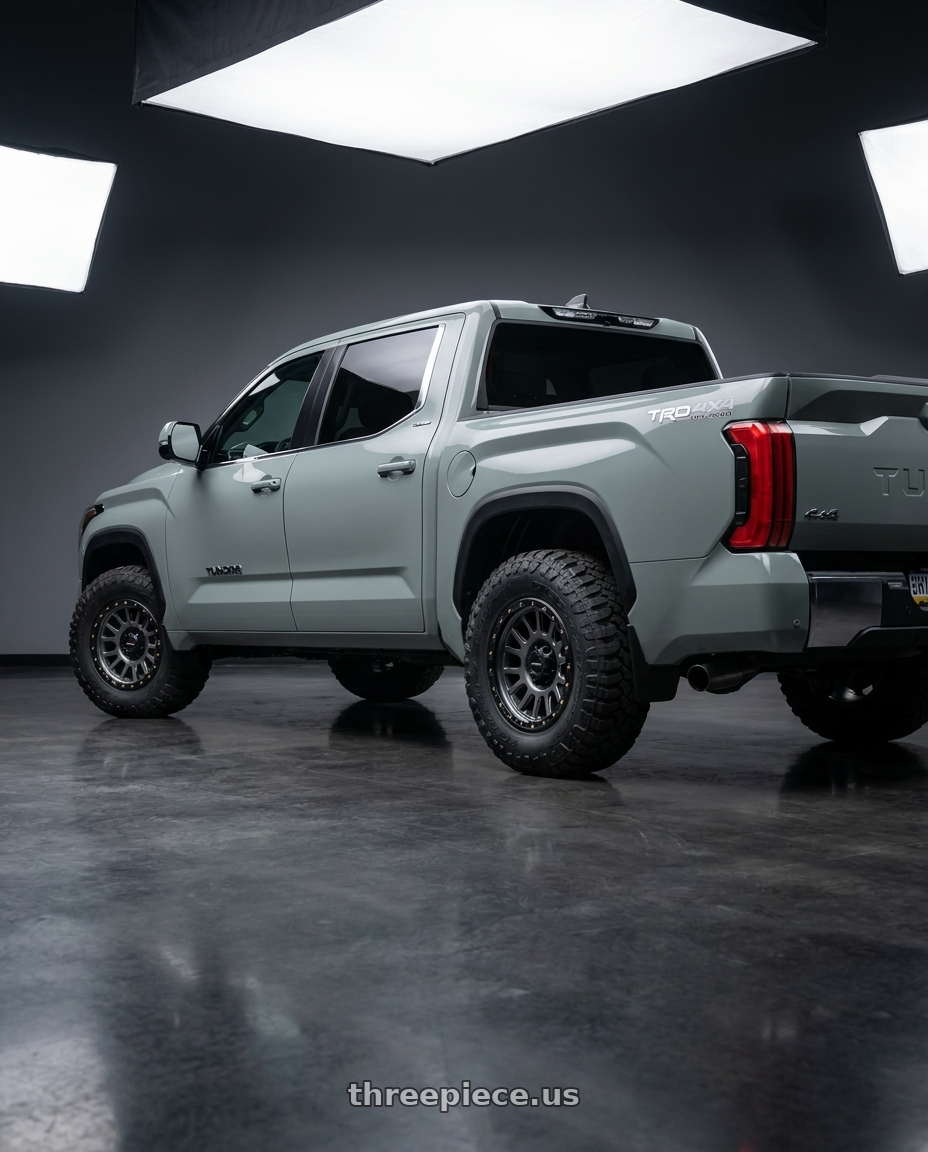 2024 Toyota Tundra with Vision Off-Road 111 Nemesis 6x139.7 20x9+12 Gunmetal wheels rear three quarter view meaty tires