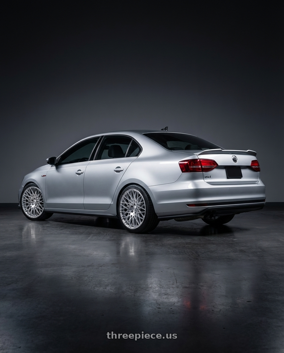 2016 Volkswagen Jetta GLI MK6 with Avant Garde Wheels M540 5X112 18x9 +48 Silver Machined wheels rear three quarter view square tires