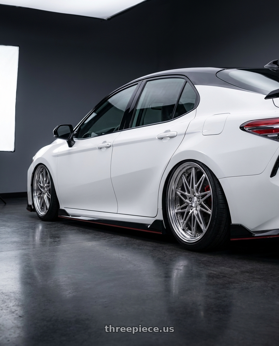 2021 Camry TRD v6 with Work Schwert Sg1 5x114.3 19x9.5+22 A Disk Glim Silver wheels rear three quarter view slight stretch tires