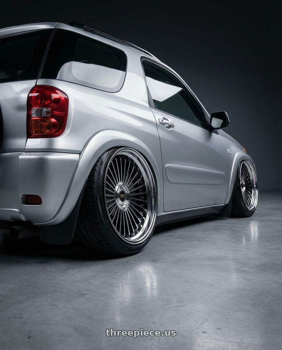 2005 Toyota RAV4 3dr with Work Emitz Black Polish 5x114.3 19x9.0 +0 wheels rear three quarter view extreme stretch tires