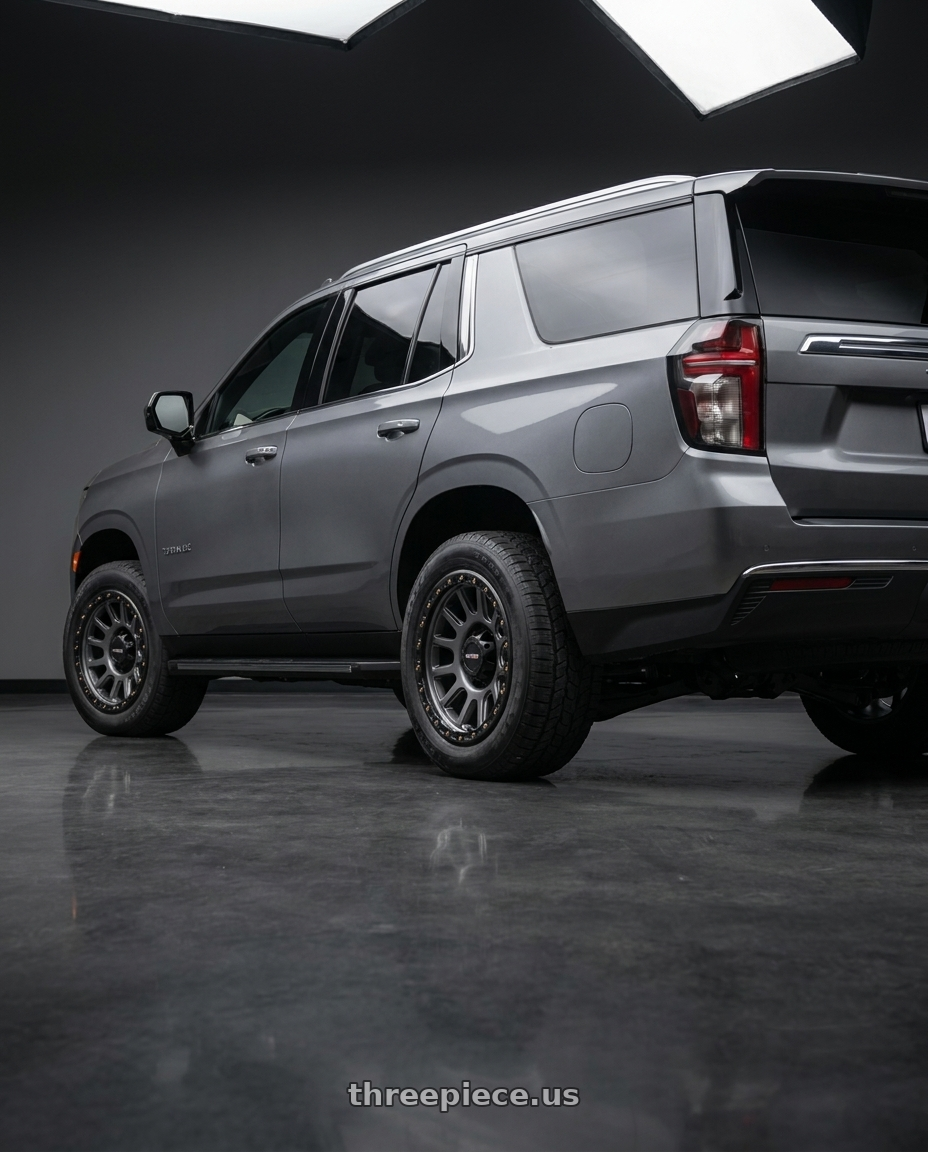 2021 Chevrolet Tahoe LS with Vision Off-Road 111 Nemesis 6x139.7 20x9+12 Gunmetal wheels rear three quarter view square tires