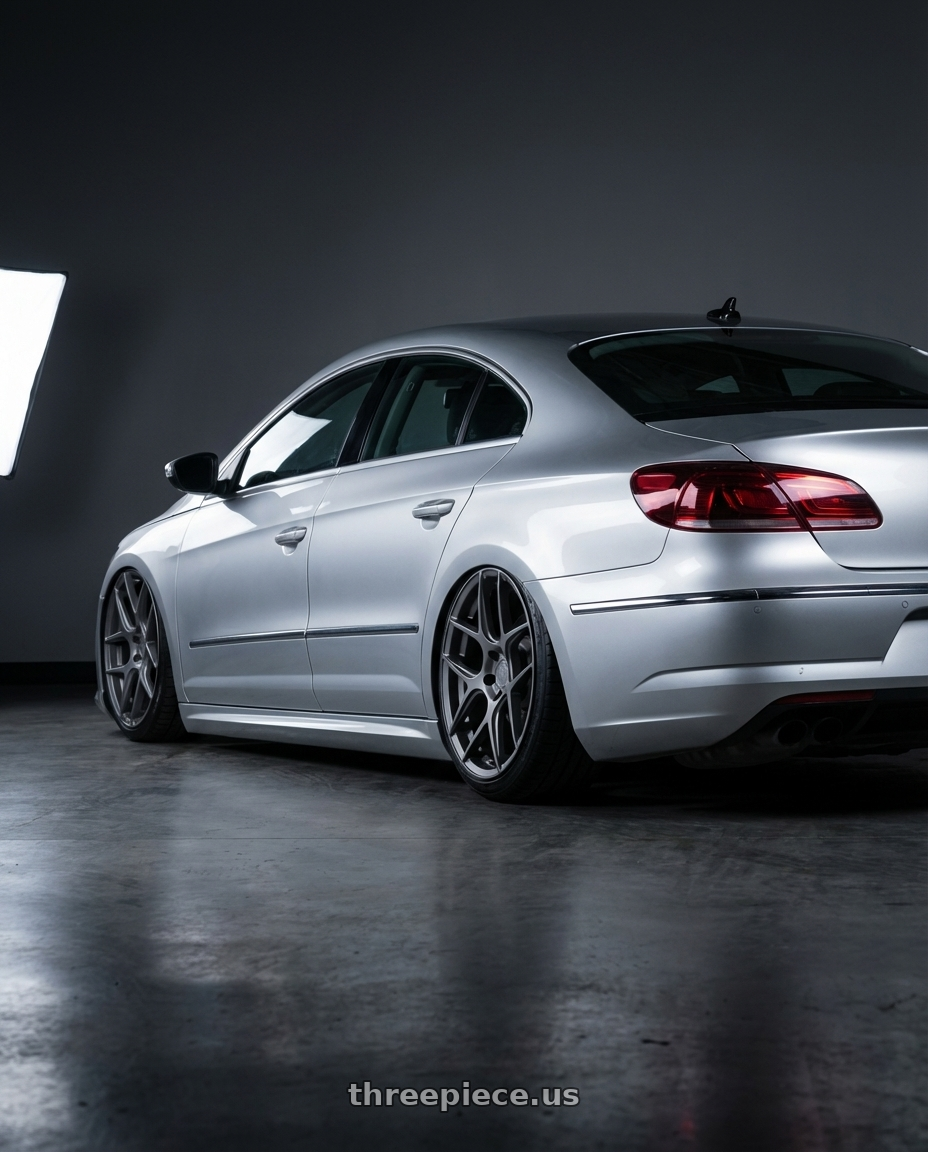 2015 Volkswagen CC with Aodhan AFF2 5x112 19x9.5+35 Matte Gray wheels rear three quarter view slight stretch tires