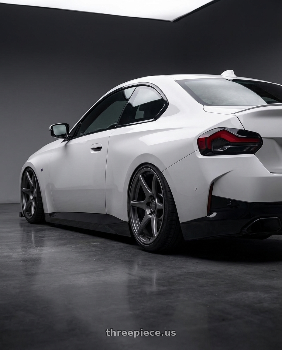 2024 BMW 2 Series G42 with Kansei K11G Tandem 5X112 19x9.5 22 Gunmetal wheels rear three quarter view slight stretch tires