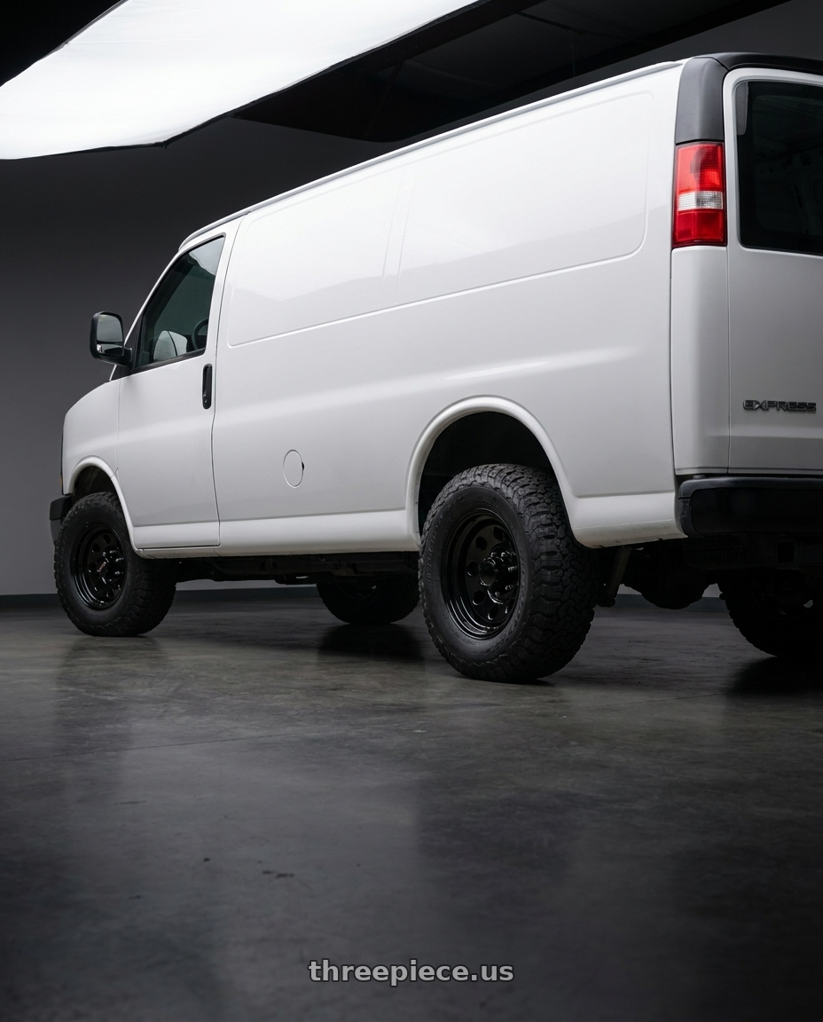 2018 Chevy Express van white with Vision HD 85H 8x165.1 16x7+0 Gloss Black wheels rear three quarter view meaty tires