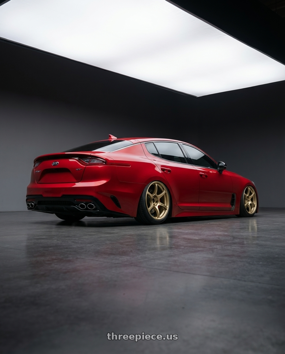 2022 Kia Stinger GT with Advan RGIII 5x114.3 19x10.5+15 Gold wheels rear three quarter view slight stretch tires