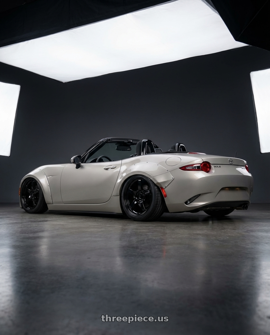 2021 Mazda MX-5 Miata ND with Gram Lights 57CR 5x114.3 17x9+22 Glossy Black wheels rear three quarter view slight stretch tires