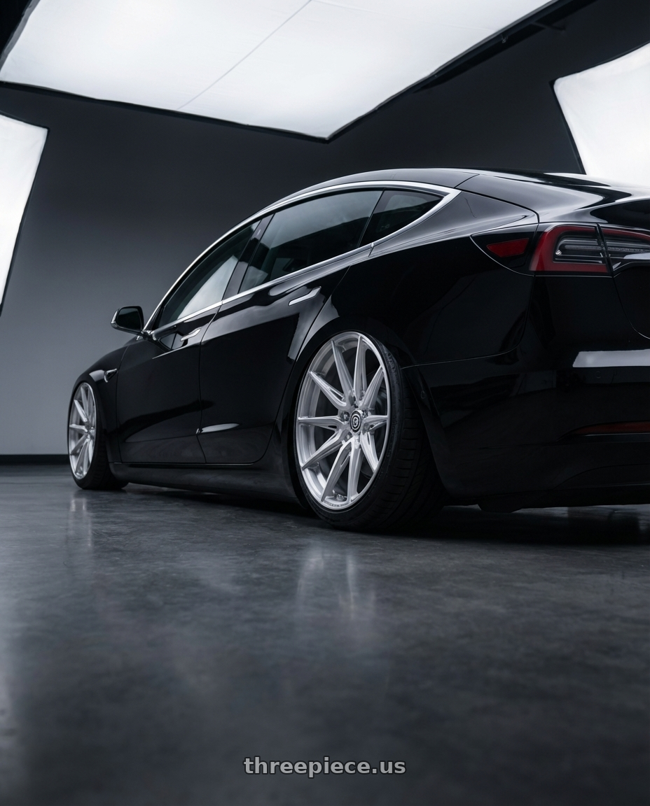 2021 tesla model 3 with Brada Wheels CX2 5x112 19x11 +15 Brushed Hyper Silver wheels rear three quarter view slight stretch tires