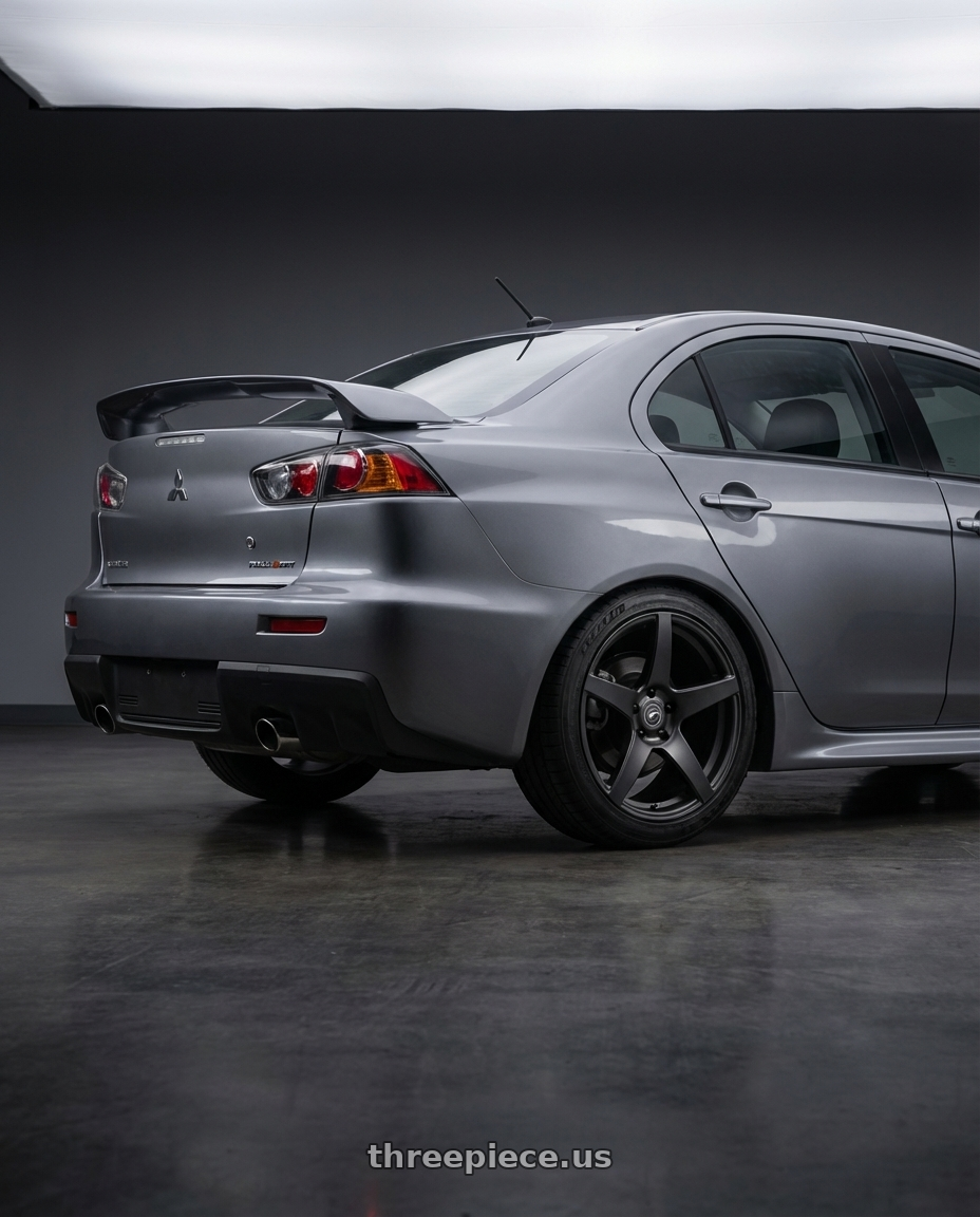 2014 Mitsubishi Lancer Ralliart with Forgestar CF5 5x114.3 18x9 +35 Satin Black wheels rear three quarter view square tires